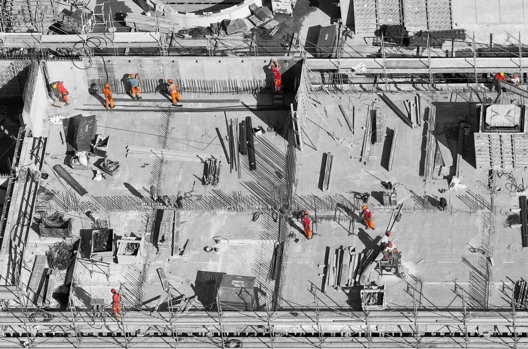 Crews working a commercial construction deck
